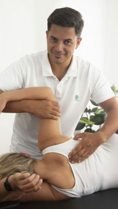 a woman getting a back massage from a man